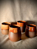 Set of stemless stoneware wine glasses in rust glaze, handmade by VanWest Studios