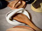 Hand-thrown ceramic spoon rest in use, VanWest Studios