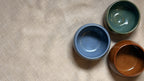 Trio of colorful handmade espresso cups